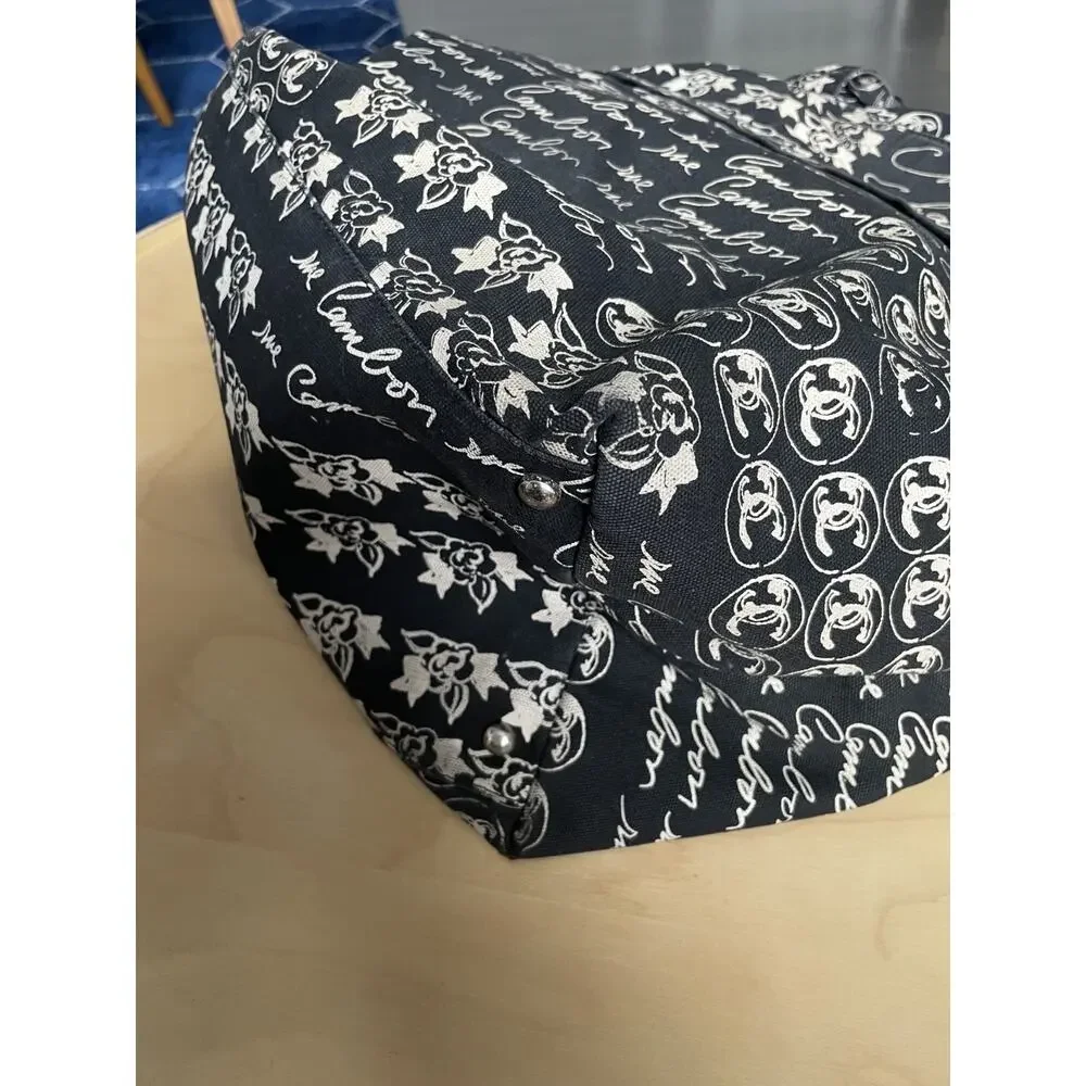 Chanel Graffiti Tote CC Print Camellia Drawstring Bag Black Cambon Mademoiselle